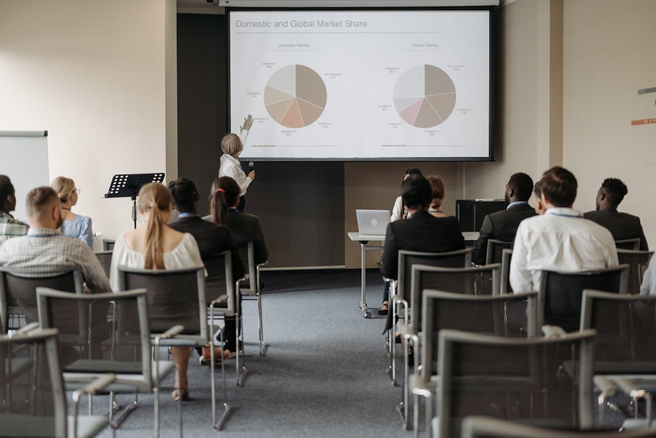 People at Business Conference Presentation