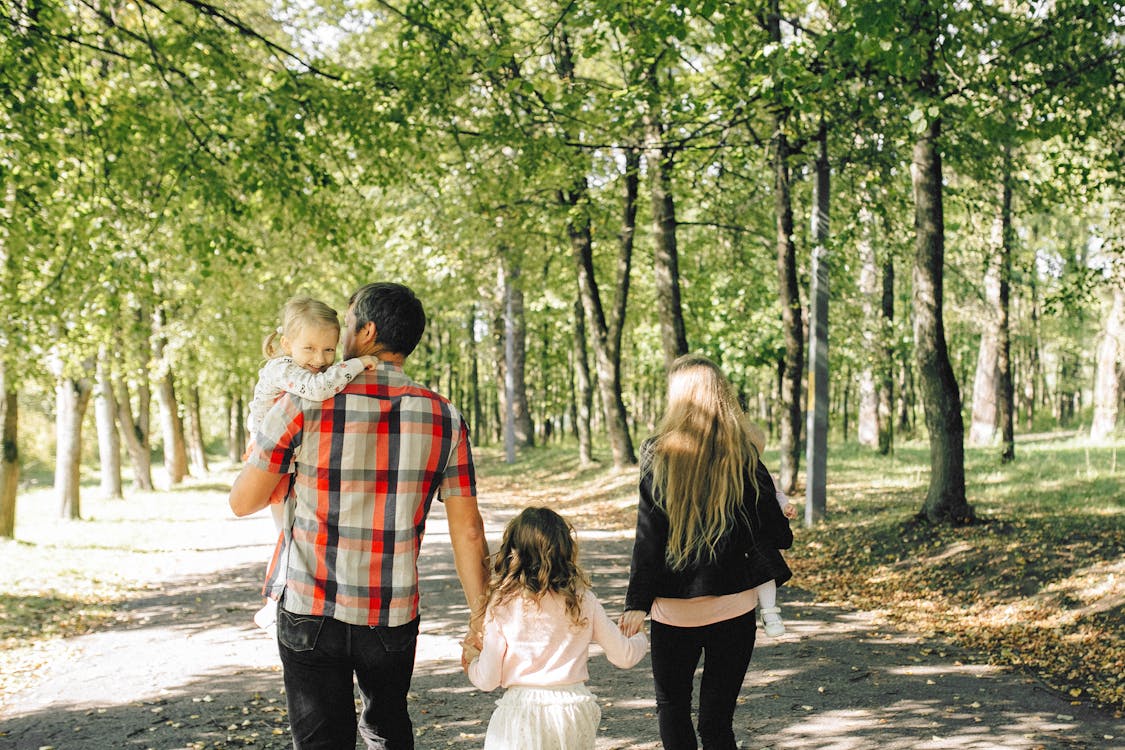 Family walking in park