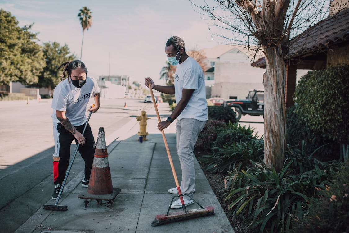 Volunteers cleaning street